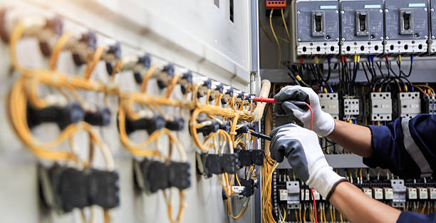 Professional Generator Installation technician working in Lyons, KS